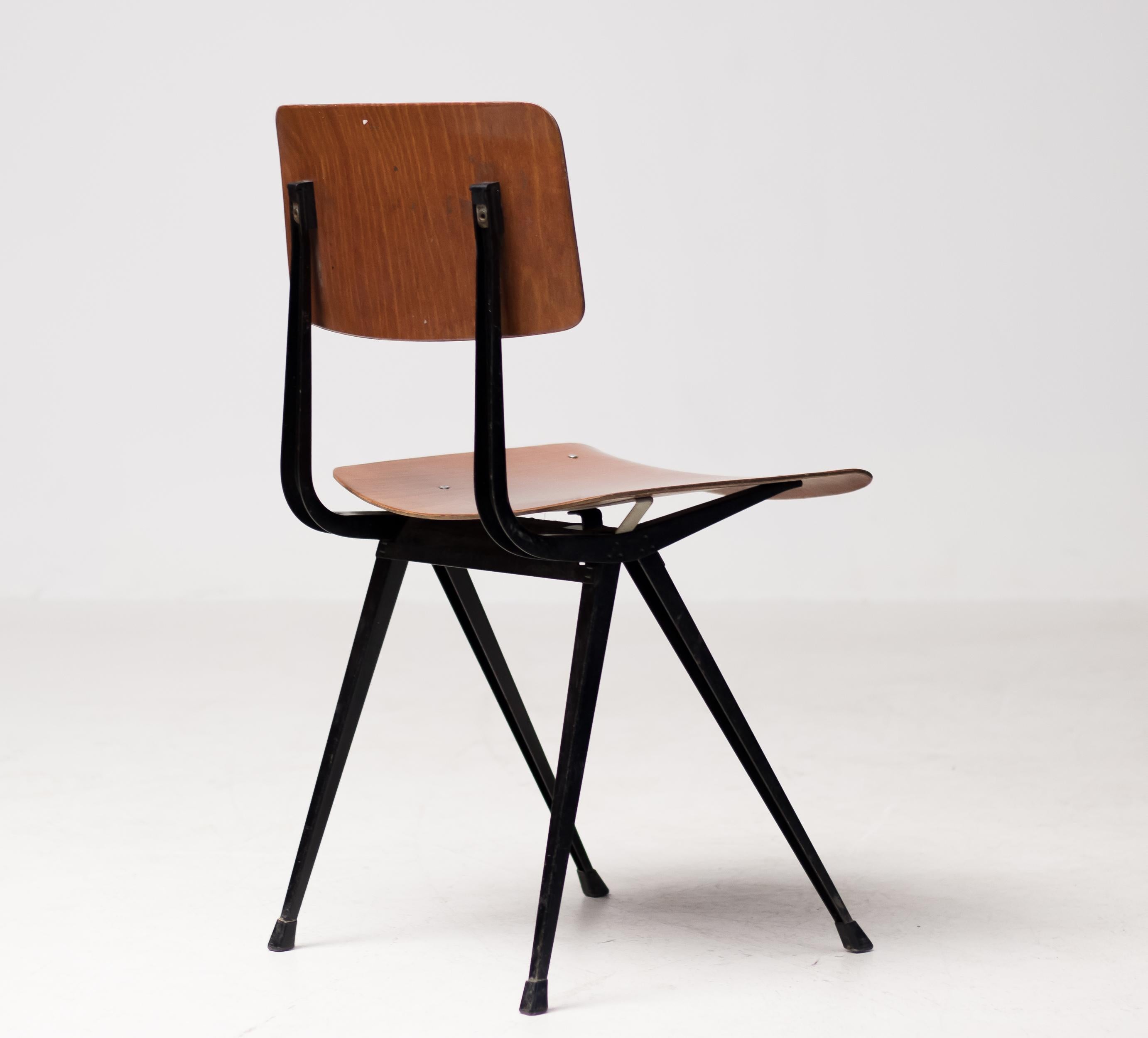 Set of twelve Result chairs, designed by Friso Kramer for Ahrend-De Cirkel in 1952.
Innovative black bent sheet steel frame with pressed wood seat and back.
Embossed logo.