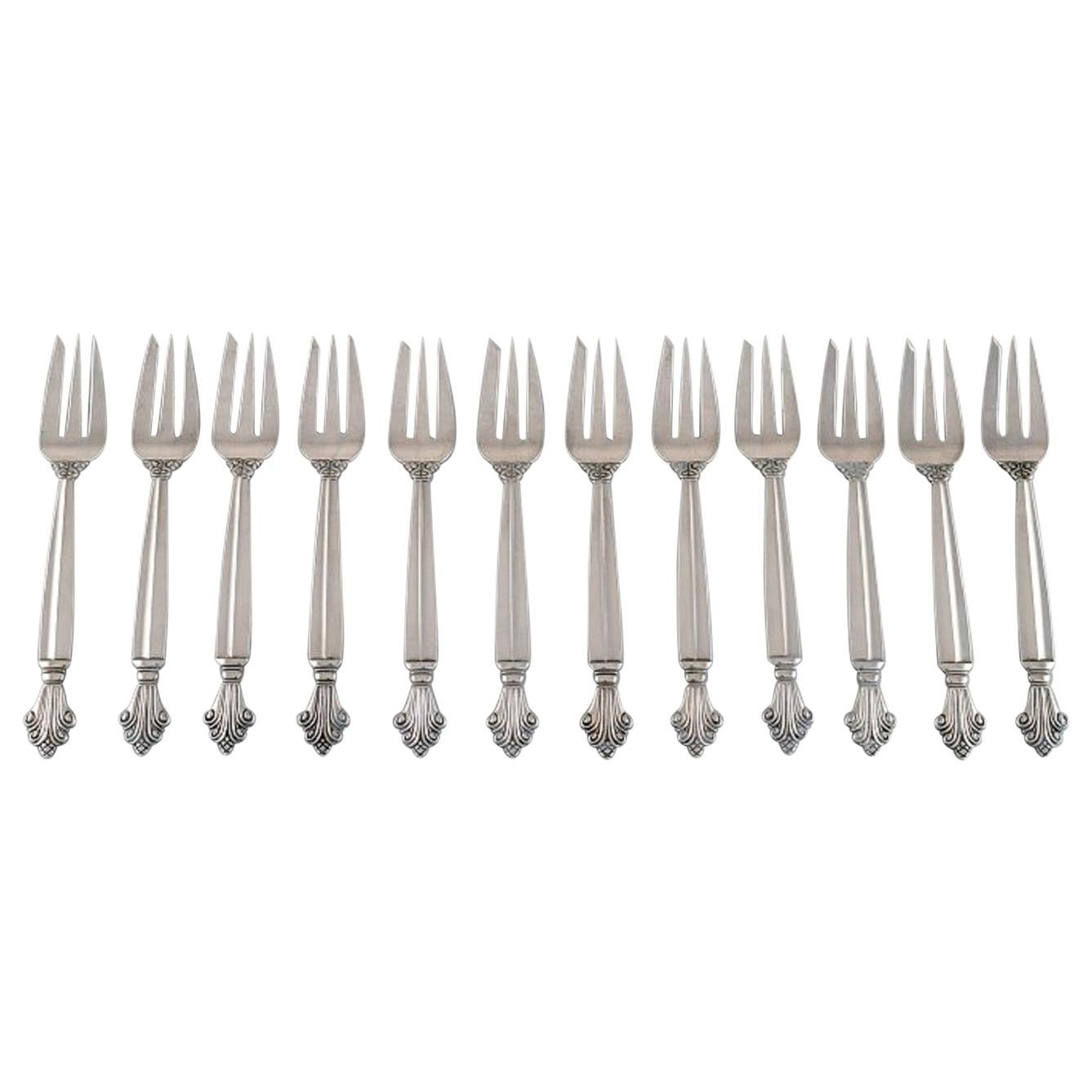 Doce tenedores de acanto para repostería Georg Jensen de plata de ley