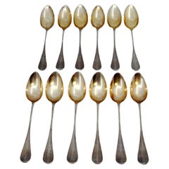 Twelve gold-plated guilloche coffee spoons with monogrammed handles