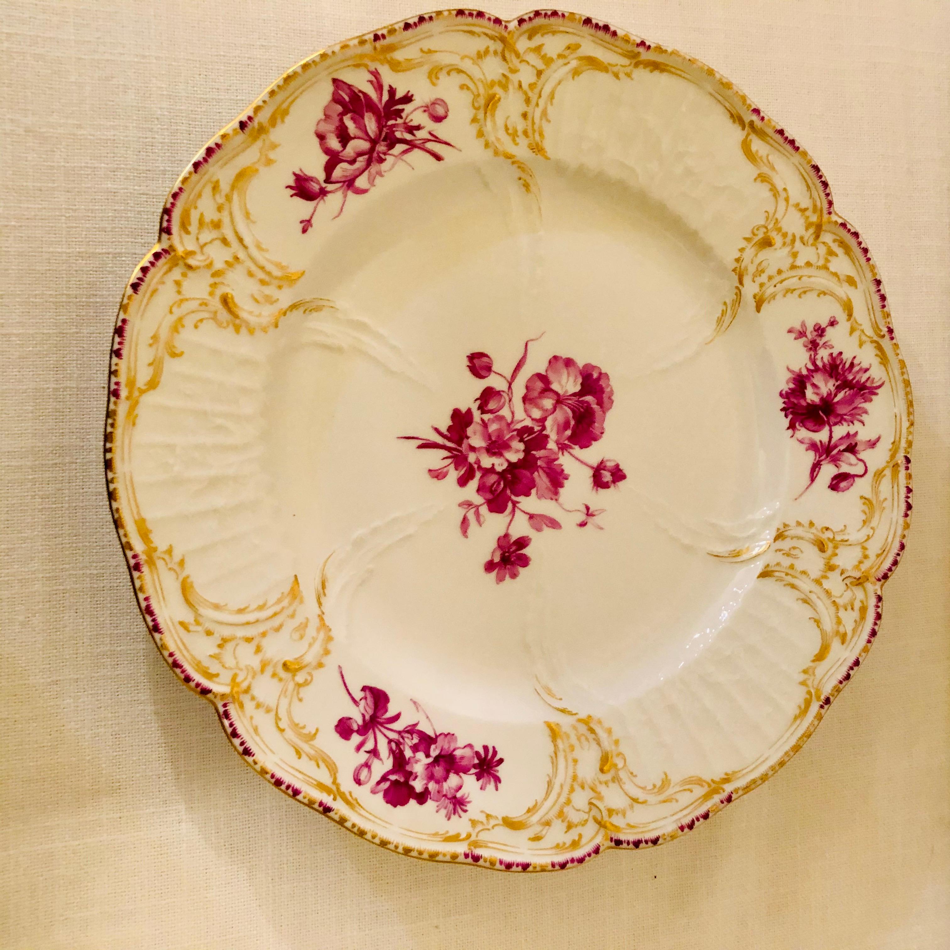 German Twelve KPM Dinner Plates Each Painted with a Different Puce Flower Bouquet For Sale