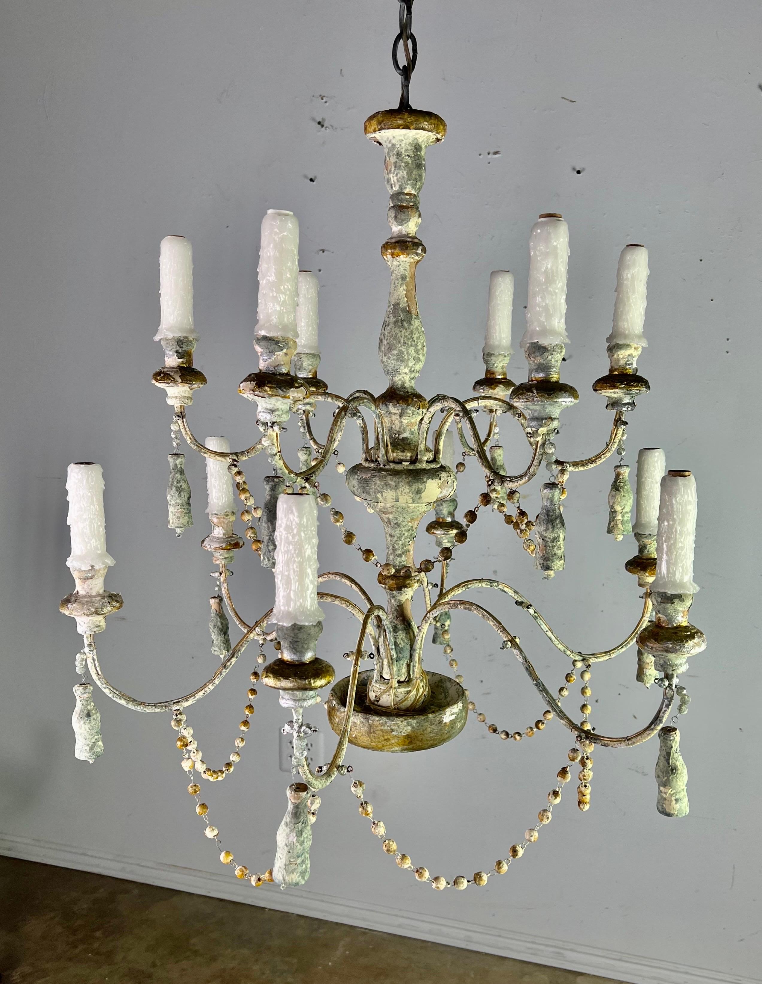 Rococo Twelve Light Wood & Iron Painted Chandelier by MLA For Sale