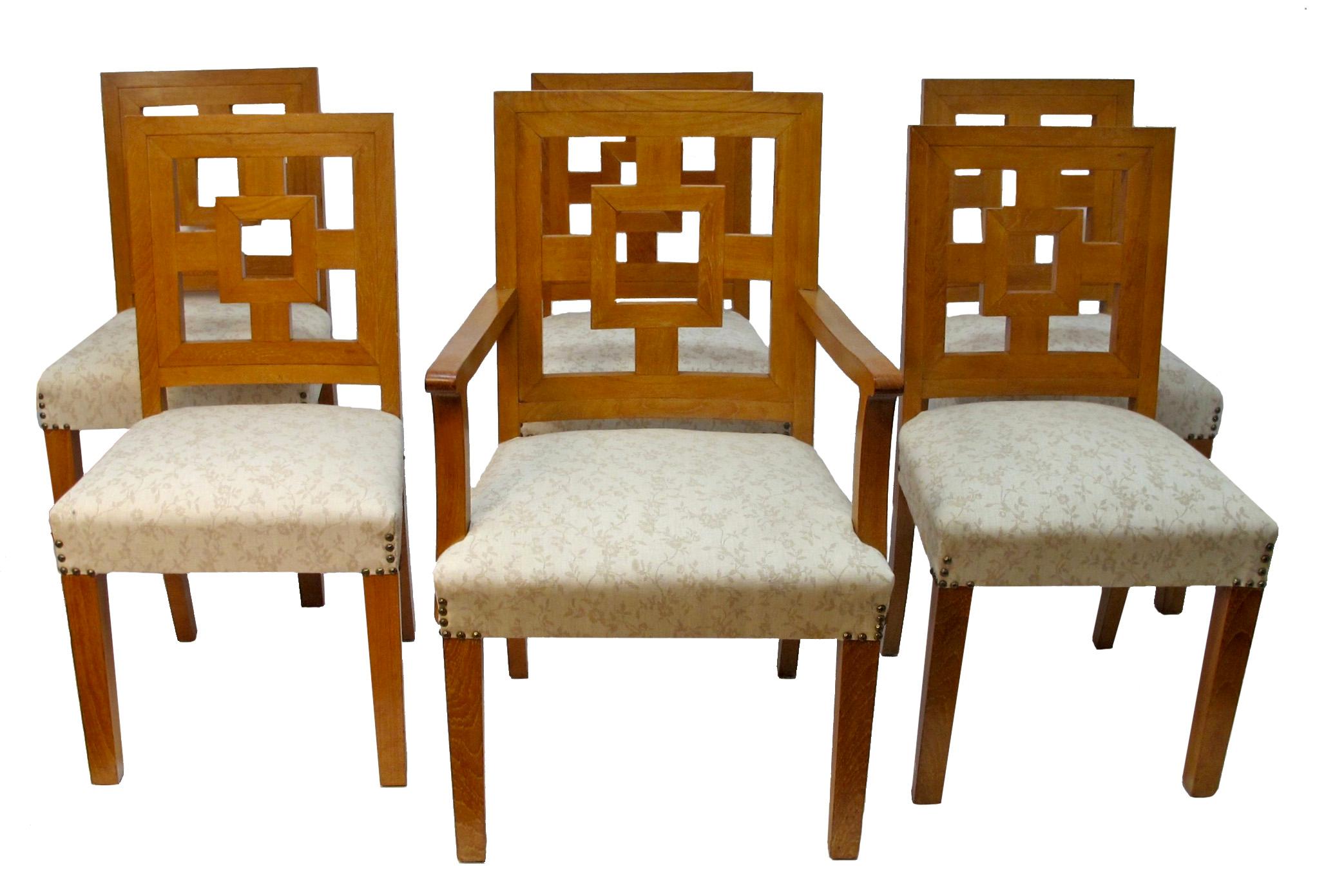 Set of eight modernist dining chairs in the style of Francis Jourdain, two armchairs and ten side chairs, cubist design with slight curve to the backrests, all with vintage upholstered seats, circa 1930s.
Chairs measures:
Side D 17