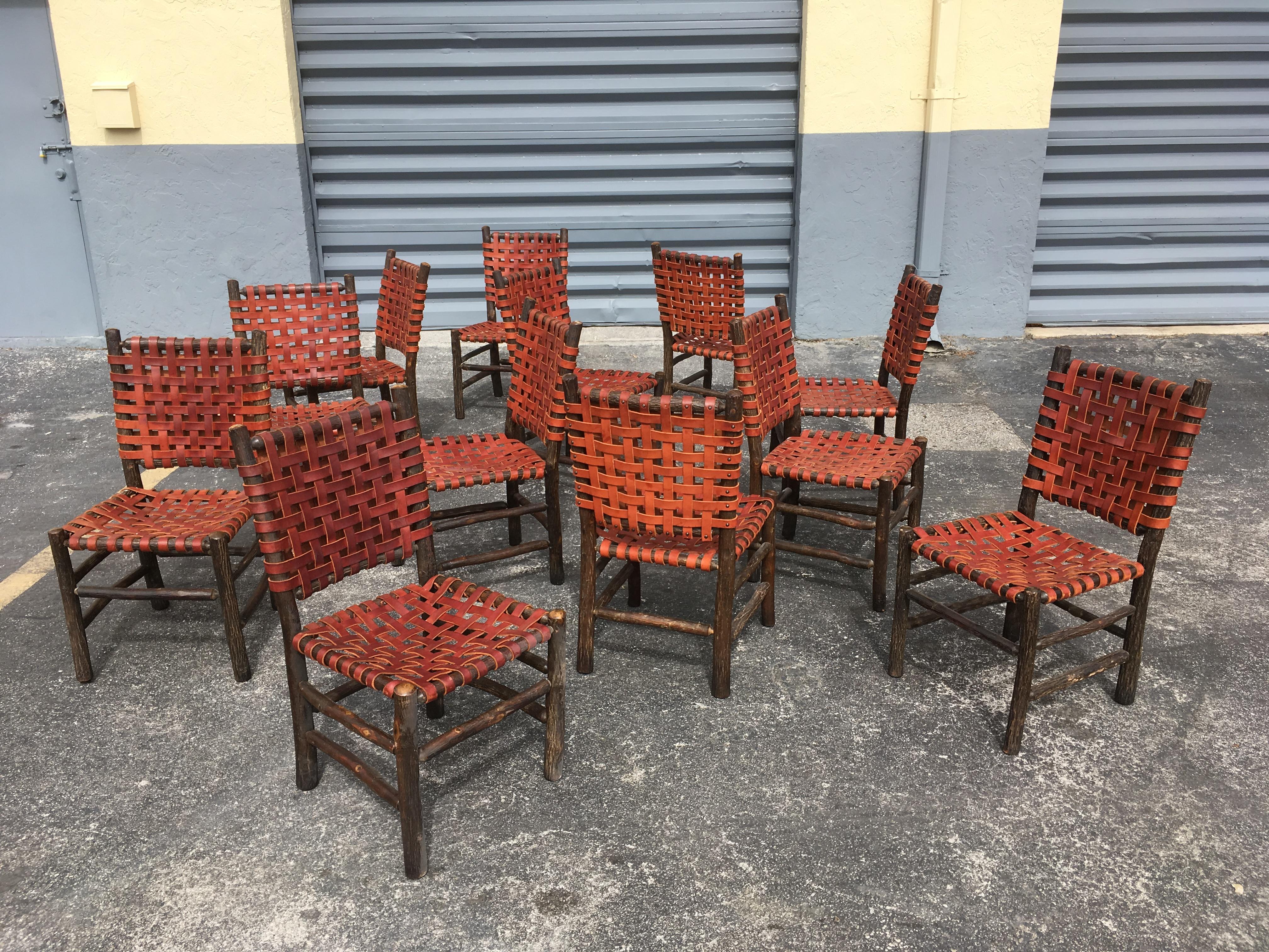 Ten Old Hickory Dining Chairs with Woven Cognac Saddle Leather 10