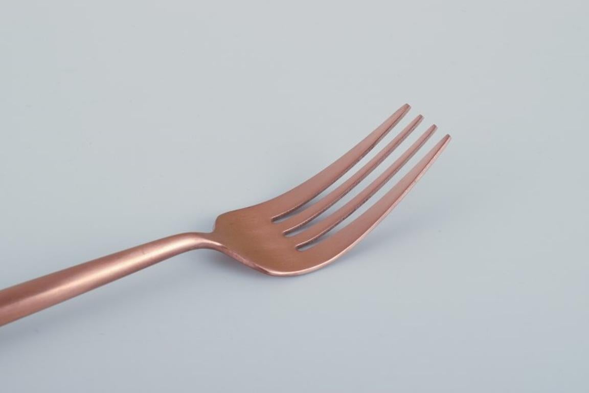 Swedish Twelve-person modernist dinner cutlery set in brass. For Sale