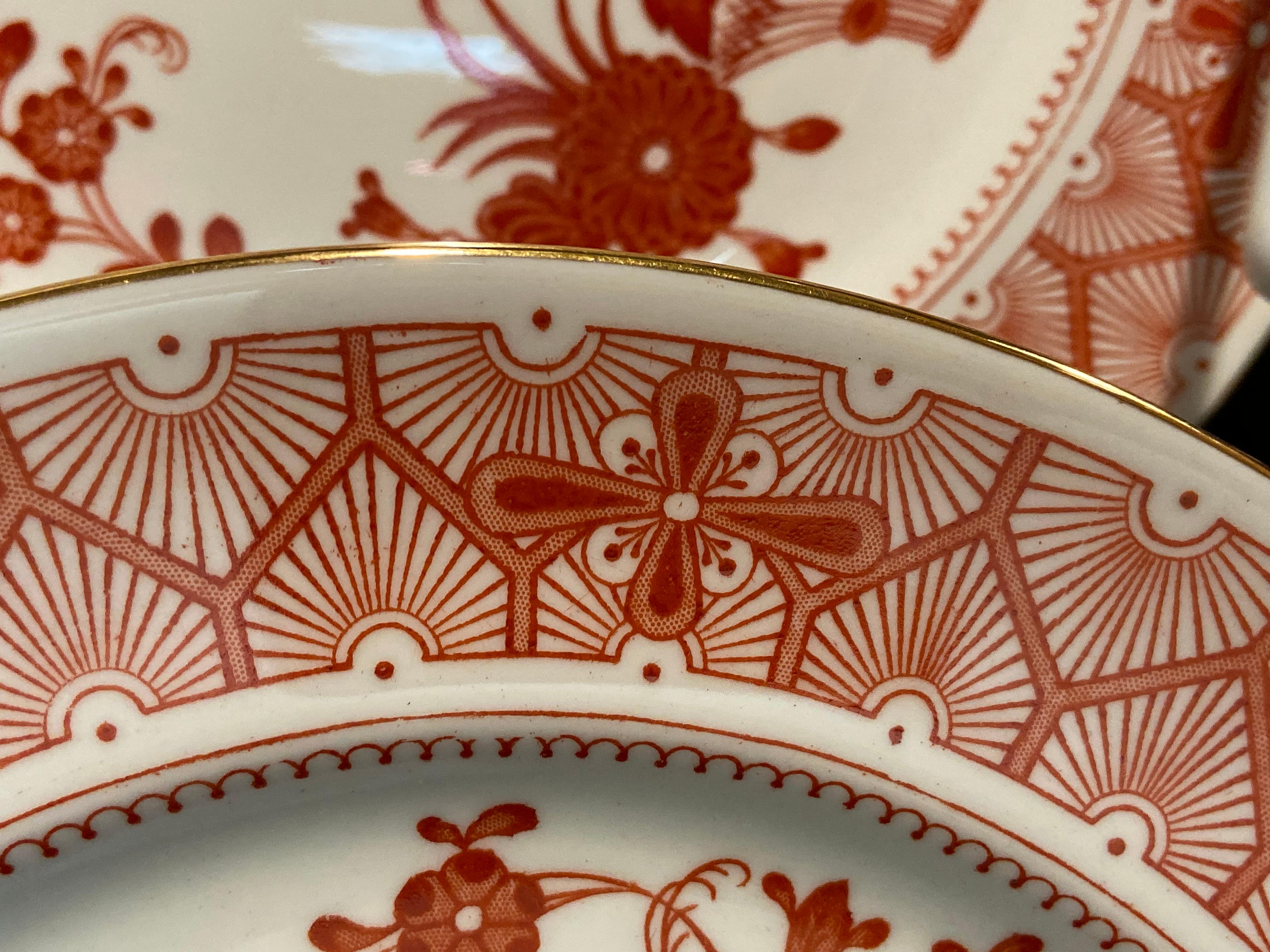 Porcelain Twelve Plates by Royal Crown Derby Chandos Pattern Burnt Orange and White