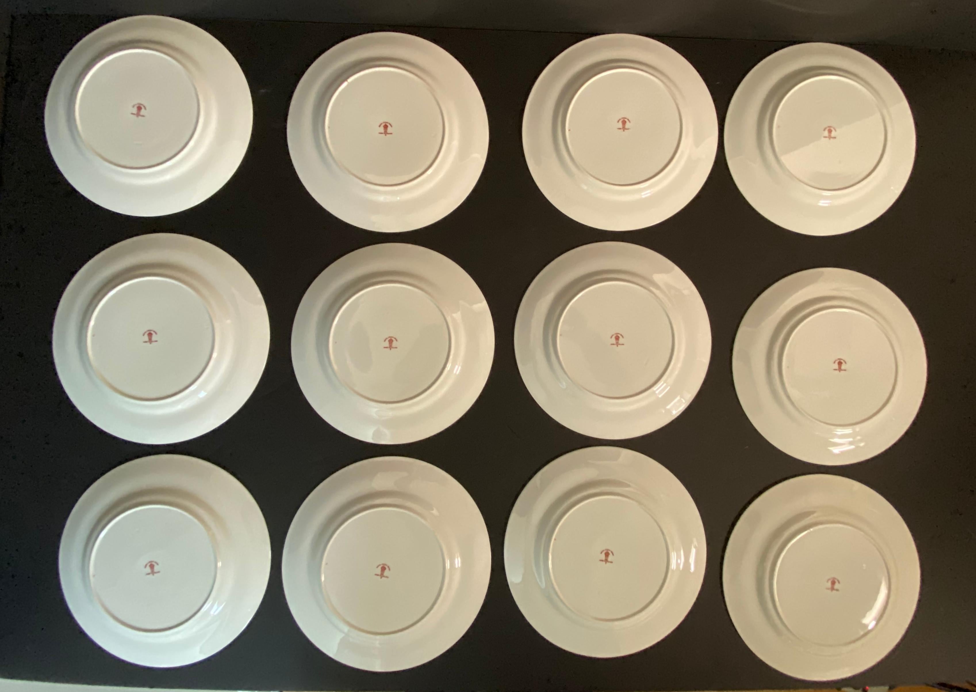 Edwardian Twelve Plates by Royal Crown Derby Chandos Pattern Burnt Orange and White