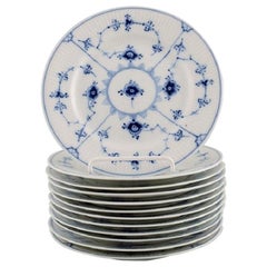 Twelve Royal Copenhagen Blue Fluted Plain Plates, Model Number 1/180 Twelve Royal Copenhagen Blue Fluted Plain Plates, Model Number 1/180