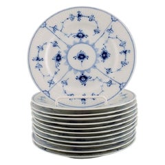 Twelve Royal Copenhagen Blue Fluted Plain Plates, Model Number 1/180