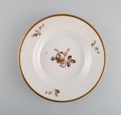 Douze assiettes profondes marron et rose Royal Copenhagen, années 1960