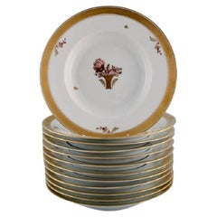 Twelve Royal Copenhagen Gold Basket Deep Plates in Porcelain with Flowers