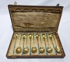 Twelve Russian .875 Silver Gilt and Cloisonne Enamel Demitasse Spoons