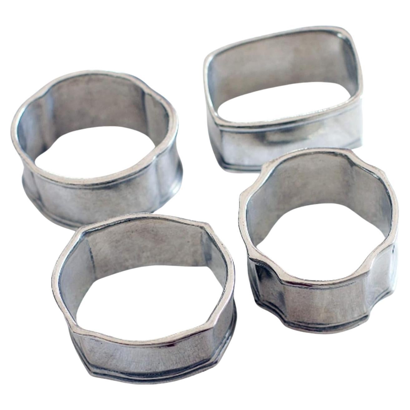 ⁦Cast from pure Vagabond House (est.1986; American) pewter, with a highly polished finish, the rings are traditional in style and timeless in form, each a gleaming band in a unique shape (each of 4 rings has a unique shape) with a sparely tooled