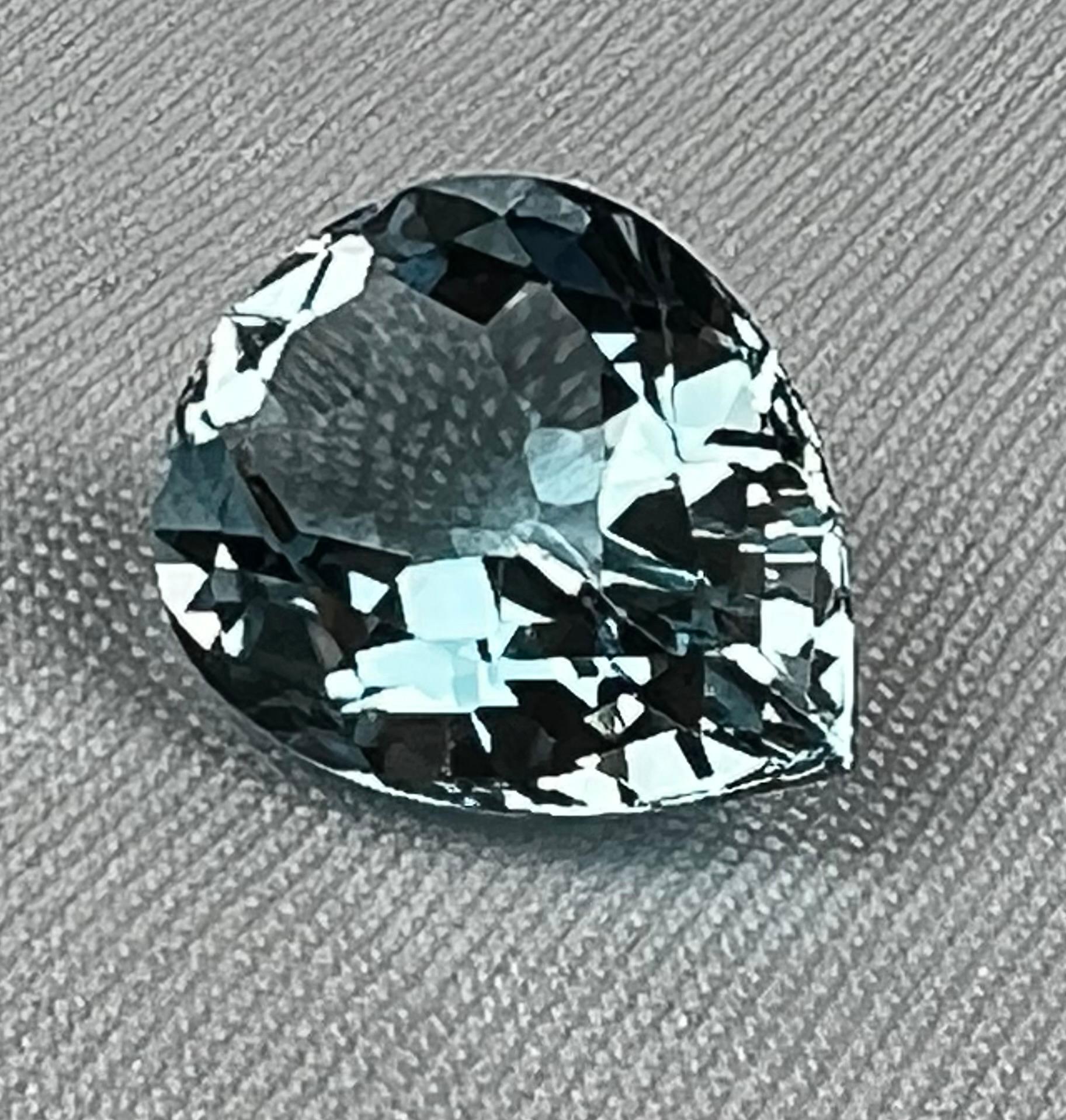 Perfect pear shaped approximately twenty carat blue topaz Brazilian fancy cut stone, sometimes referred to as a tear drop shape.
The legend of origin is marrying a marquise shape with a round brilliant shape resulting in a pear shaped stone.  This