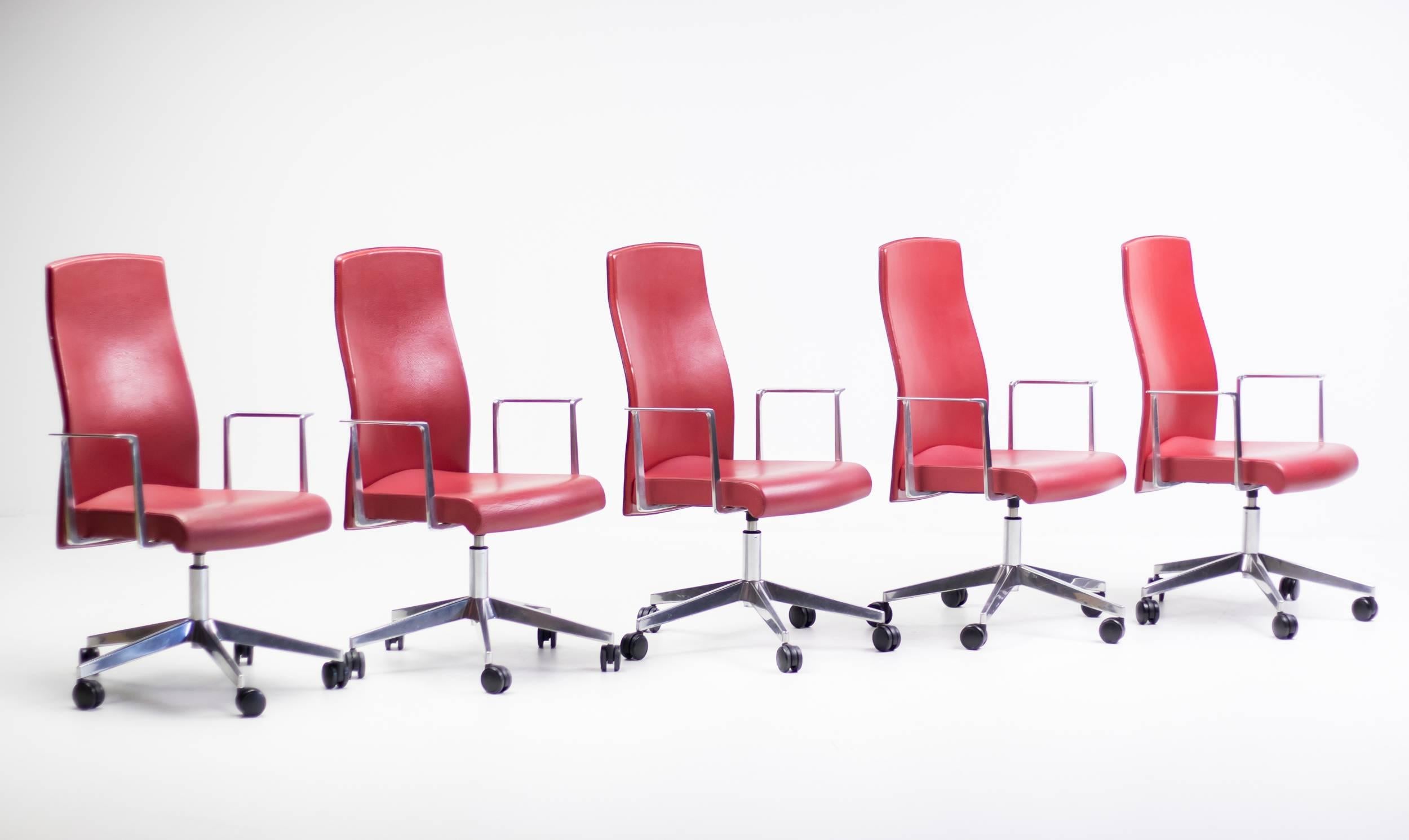 Muga revolving conference chairs with memory return, fixed height and castors.
The beautiful shaped armrests and the five star base are executed in polished cast aluminium.
Seat and back in soft oxblood red leather.
8 pieces available, priced