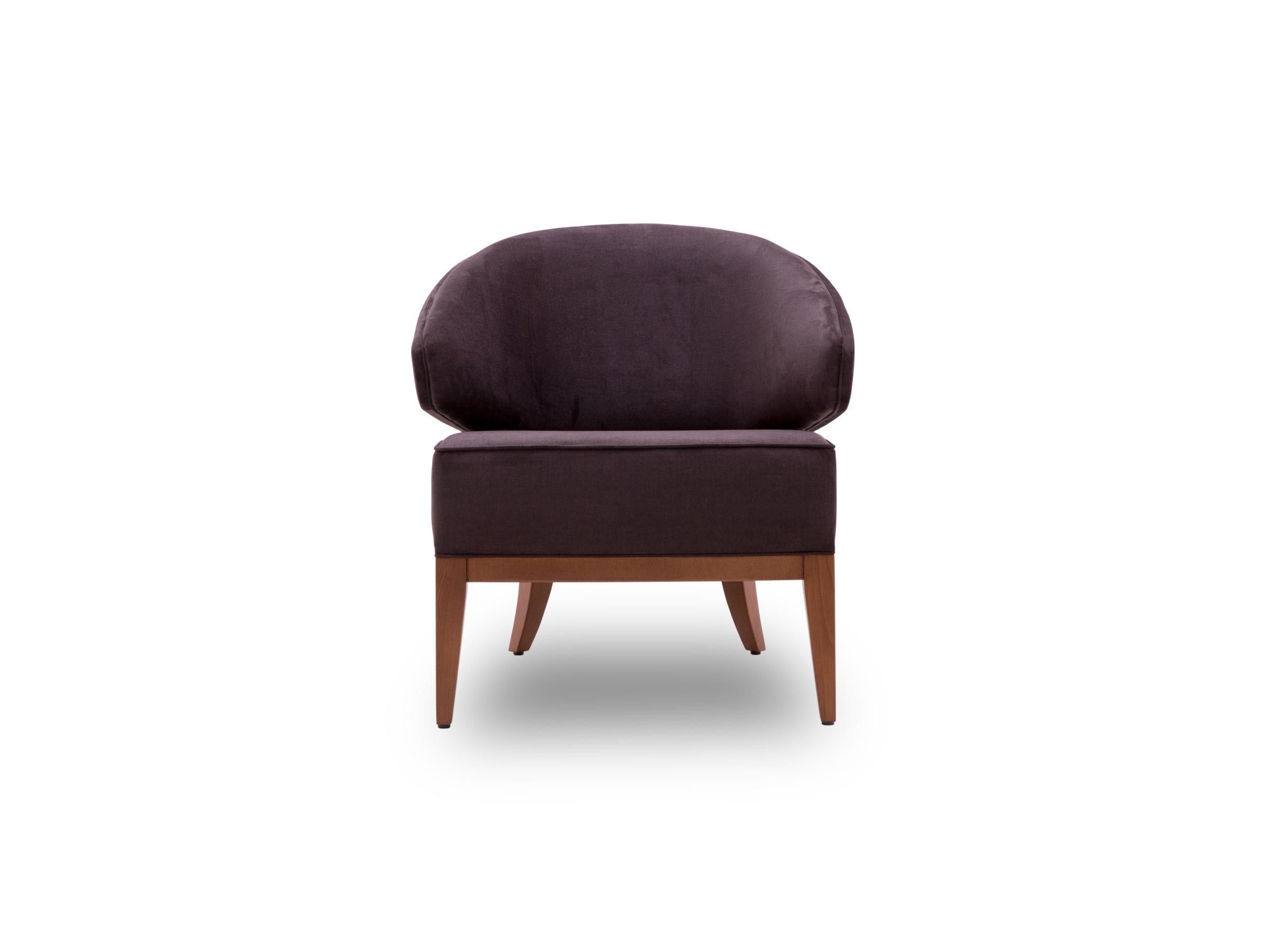 Twice Armchair's elegant curves are engineered with comfort to be a lasting addition to your home. Designed with premium style details such as piping and angled legs to deliver elegant simplicity. With its rounded back structure, aesthetic armrests