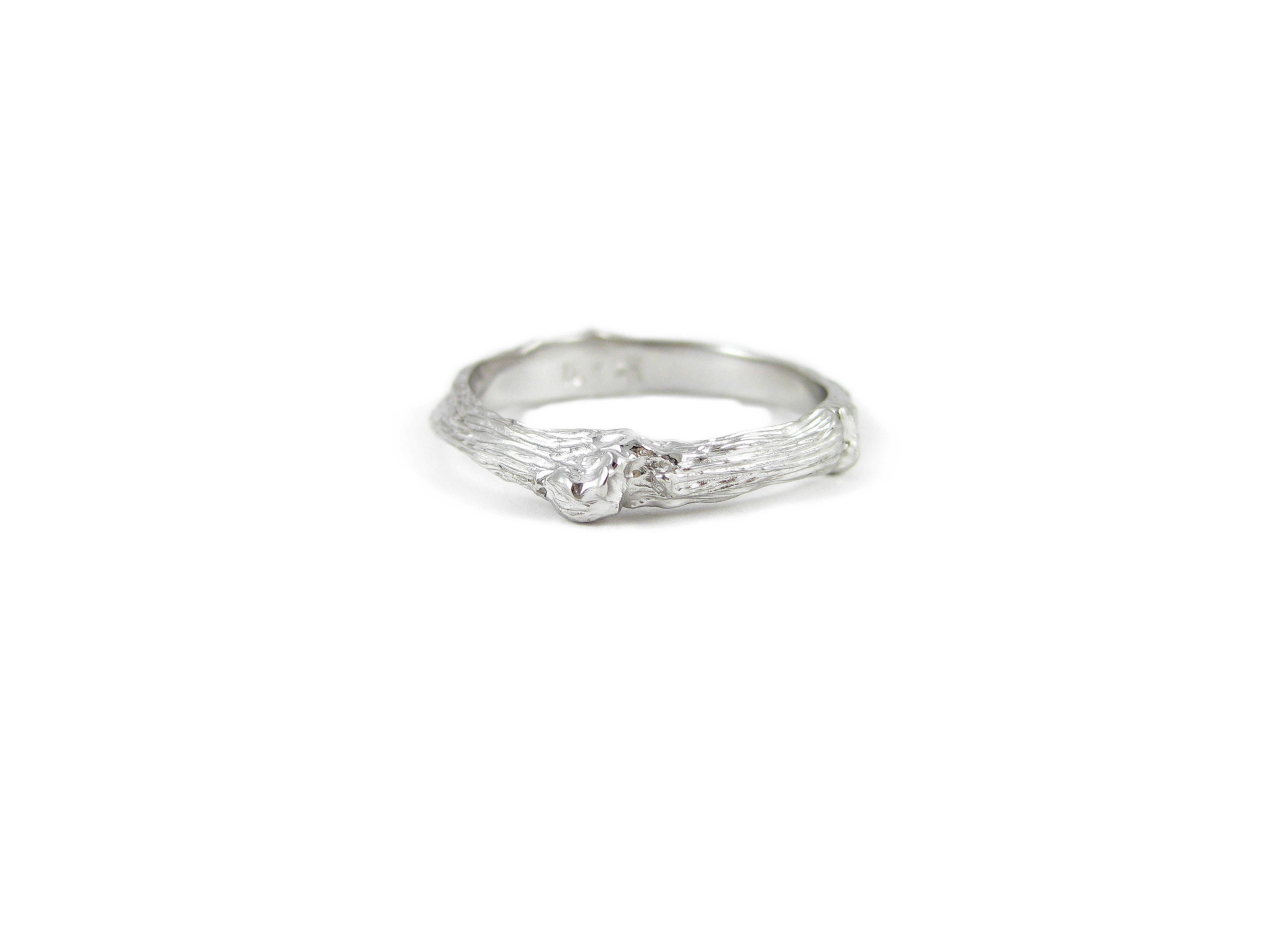 Set in 18k white gold, the organic spirit of K. Brunini is captured through the intricate twig design on a band that channels the eternal Tree of Life. This is the more delicate ring from our Twig Collection, designed to embody the power and grace