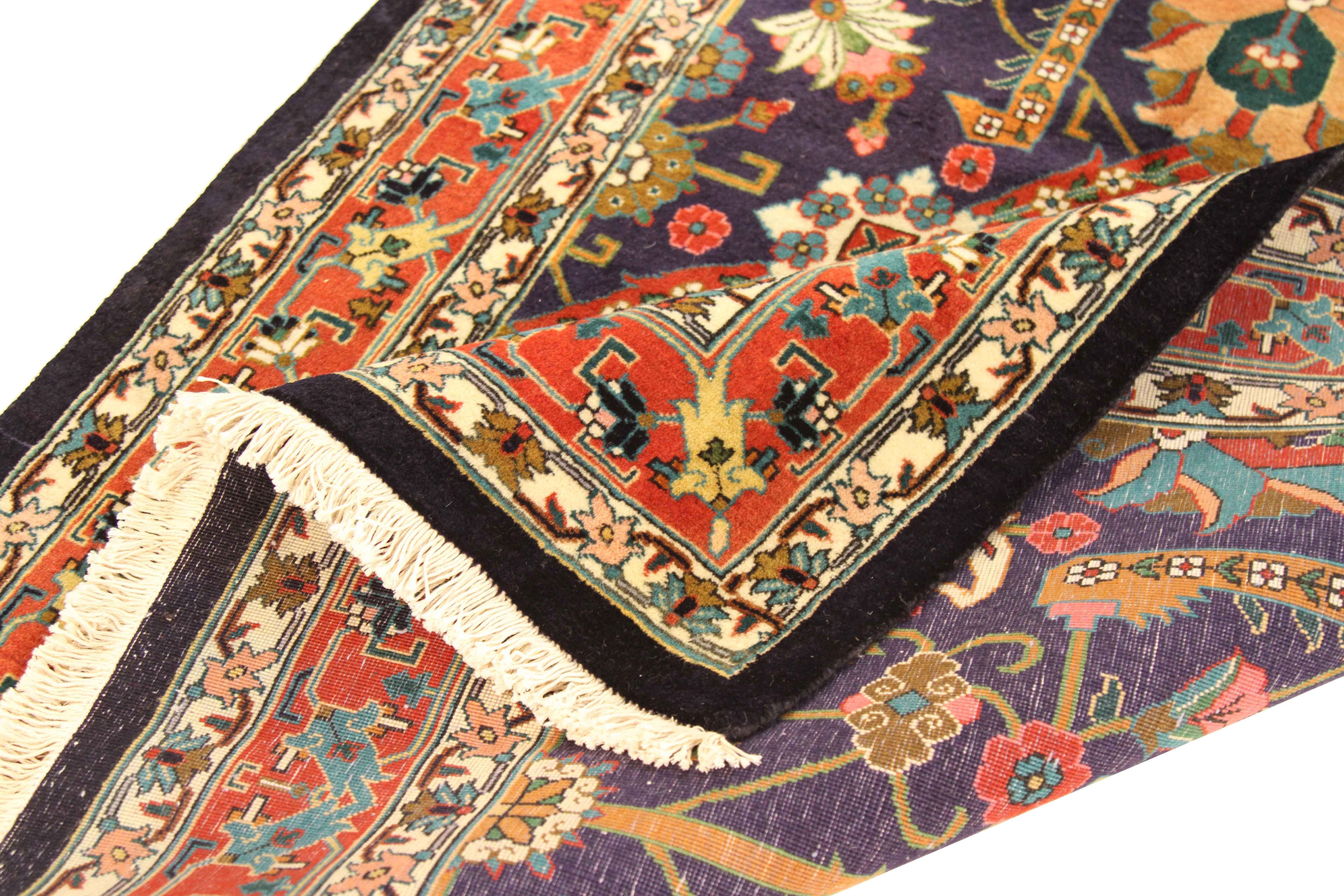 Hand knotted from exquisitely fine wool, this antique rug from Turkey displays the grand floral patterns collectors and designers love about the Tabriz style of weaving. Bursting with colors of blue, green, navy and red, it’s a great match for