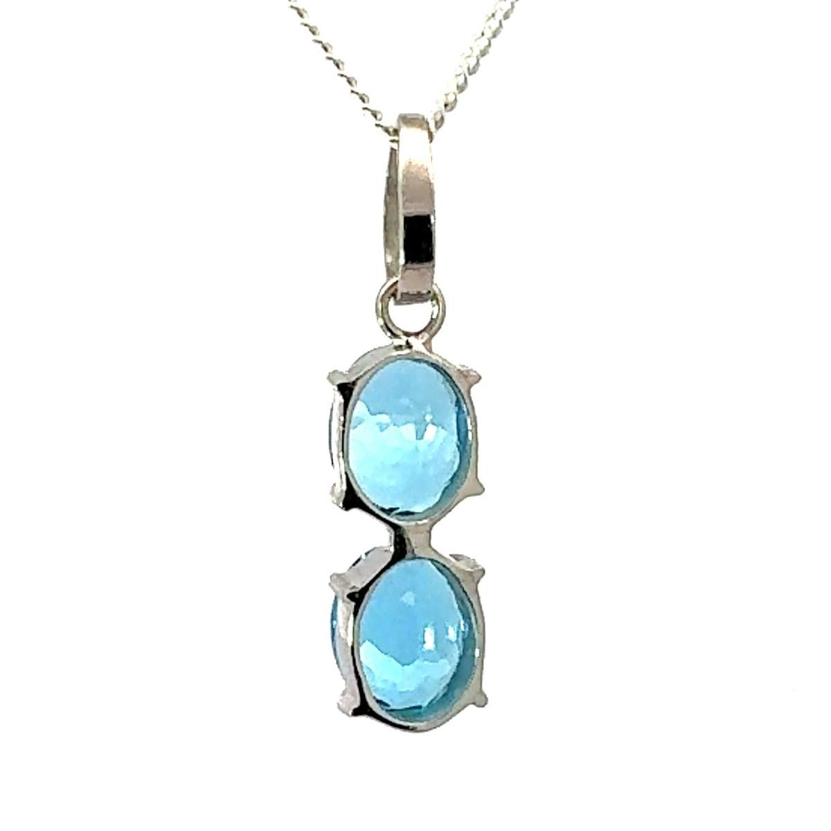 Colgante de gota vertical de topacio azul gemelo en plata 925 Regalo elegante para ella en Nuevo estado para la venta en New York, NY