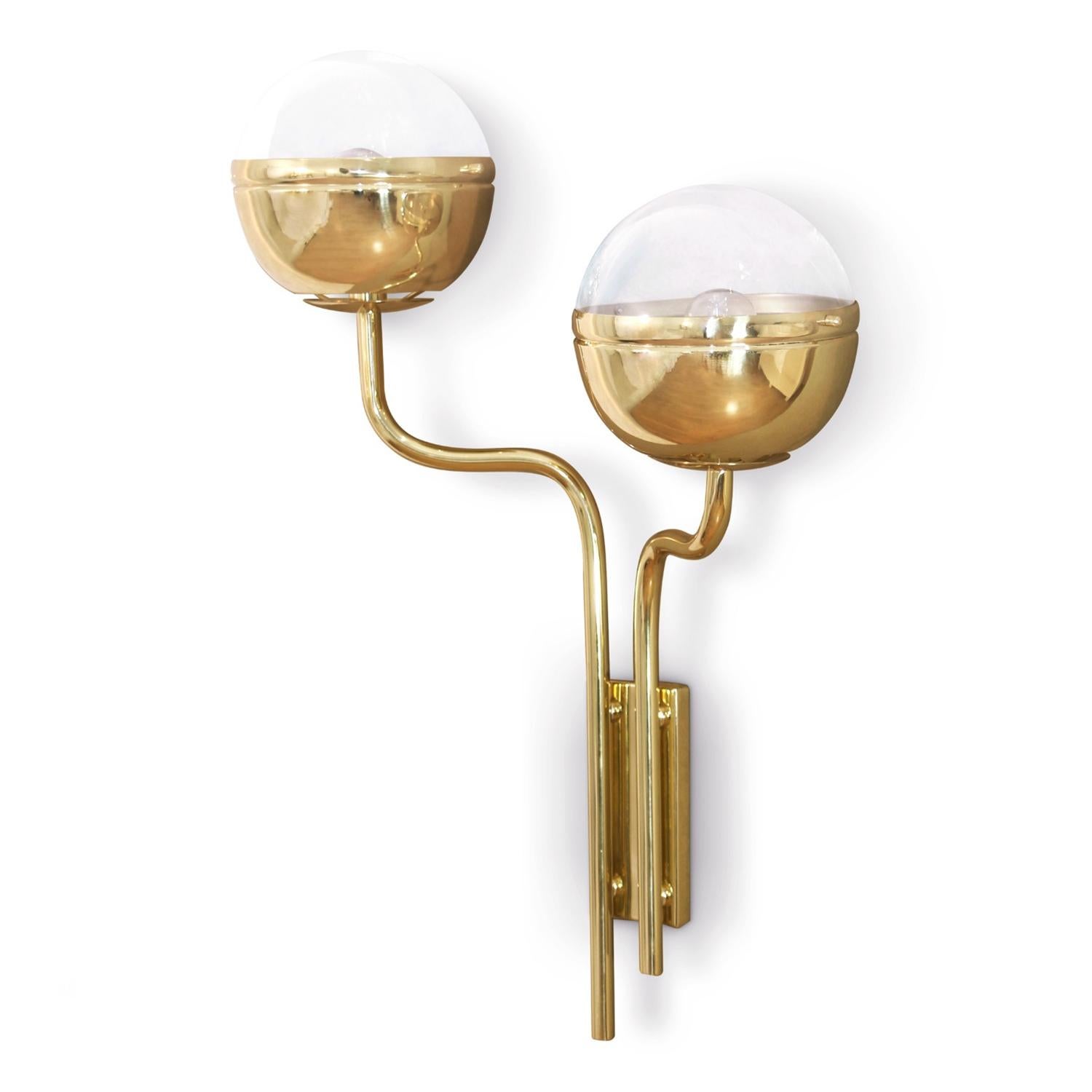Wall lamp twin brass with structure in solid brass 
in polished finish and with 2 clear glass shades.