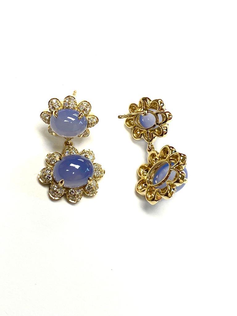 Twin Oval Cabochon Blue Chalcedony  Earrings with Diamonds in 18k Yellow Gold, from 'Limited Edition' Collection

Stone Size: 9 x 7 & 10.5 x 8.5 mm

Gemstone Weight: 11.11 Carats

Diamond G-H / VS, Approx Wt: 0.94 Carats