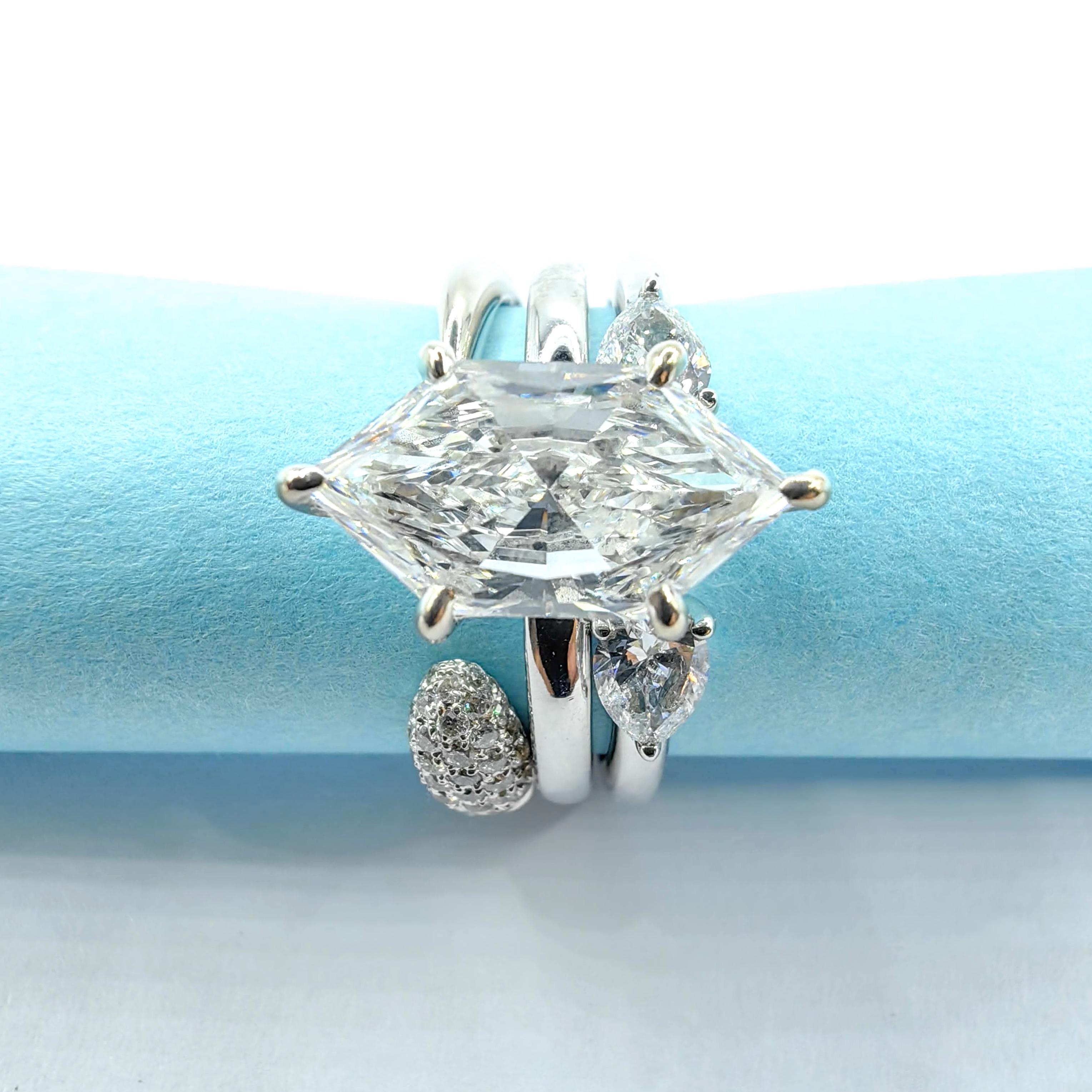 For Sale:  Twin Pear Cut Diamonds Open Shank Minimalistic Stackable Ring in 18K White Gold 9