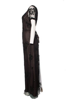 Twin-Set, Long black dress with beads.