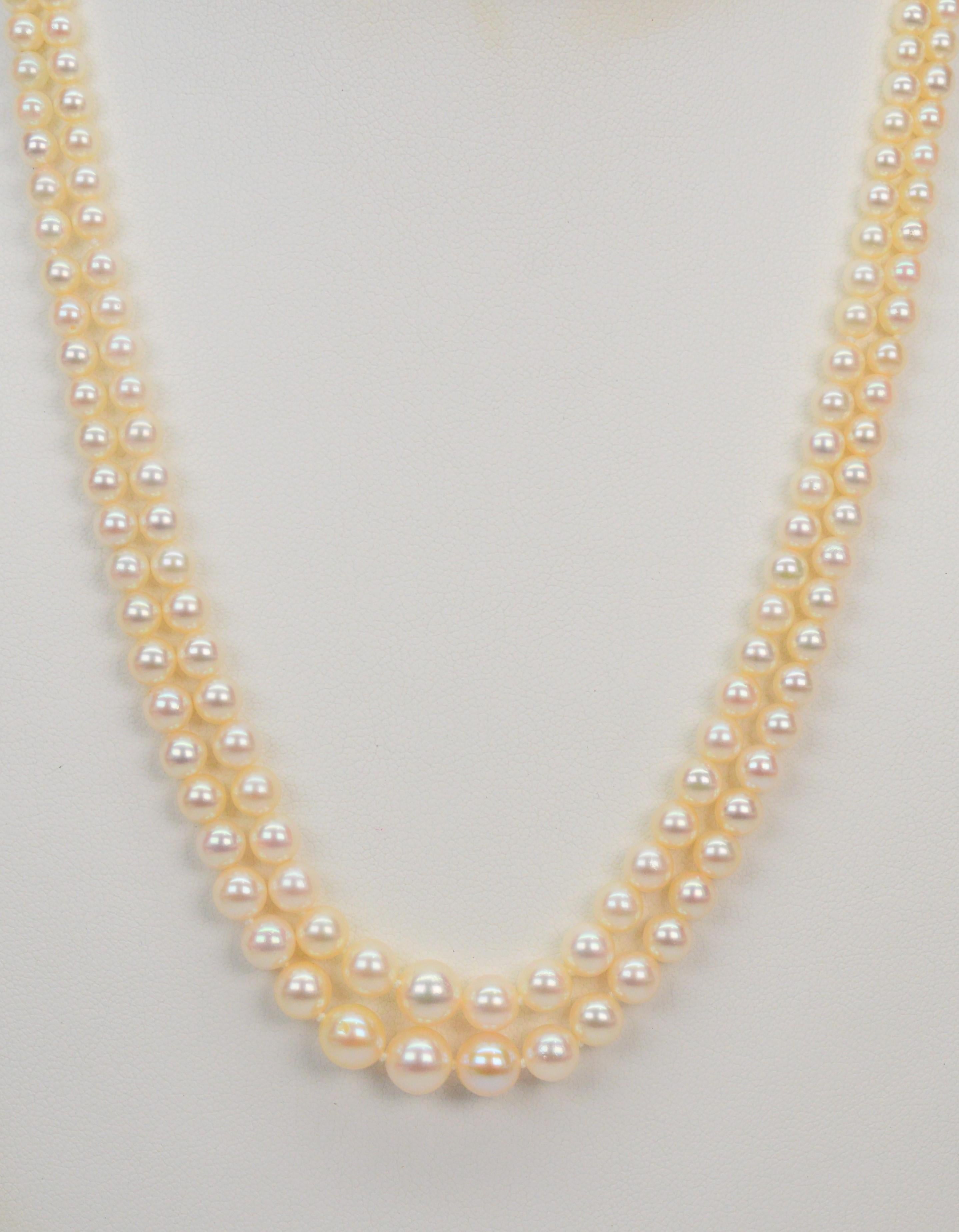 Beautifully graduated AAA pearls ranging from in size from 3mm to 6.5mm are hand strung on two nested strands to create this 18 inch necklace. 
Elegantly finished with a ten karat 10k white gold filigree clasp. Gift boxed.