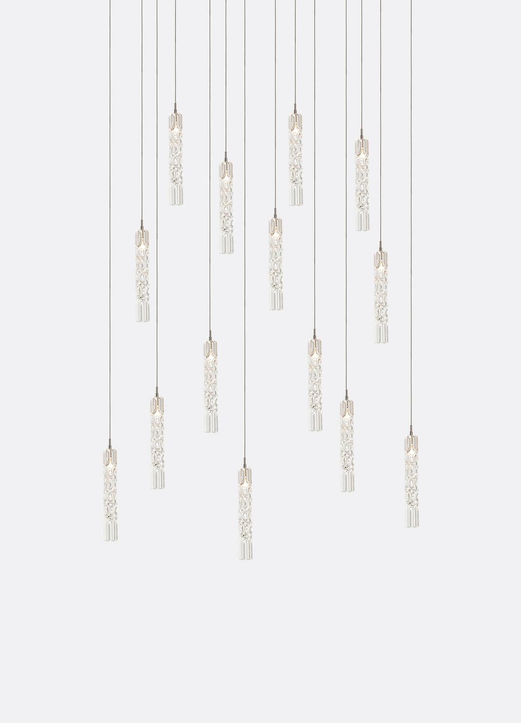 Hand blown glass pendants fixtures. 14 glass pendants on 18