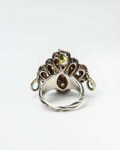Twist and Turn Silver Ring featuring Pavé Rhodolite
