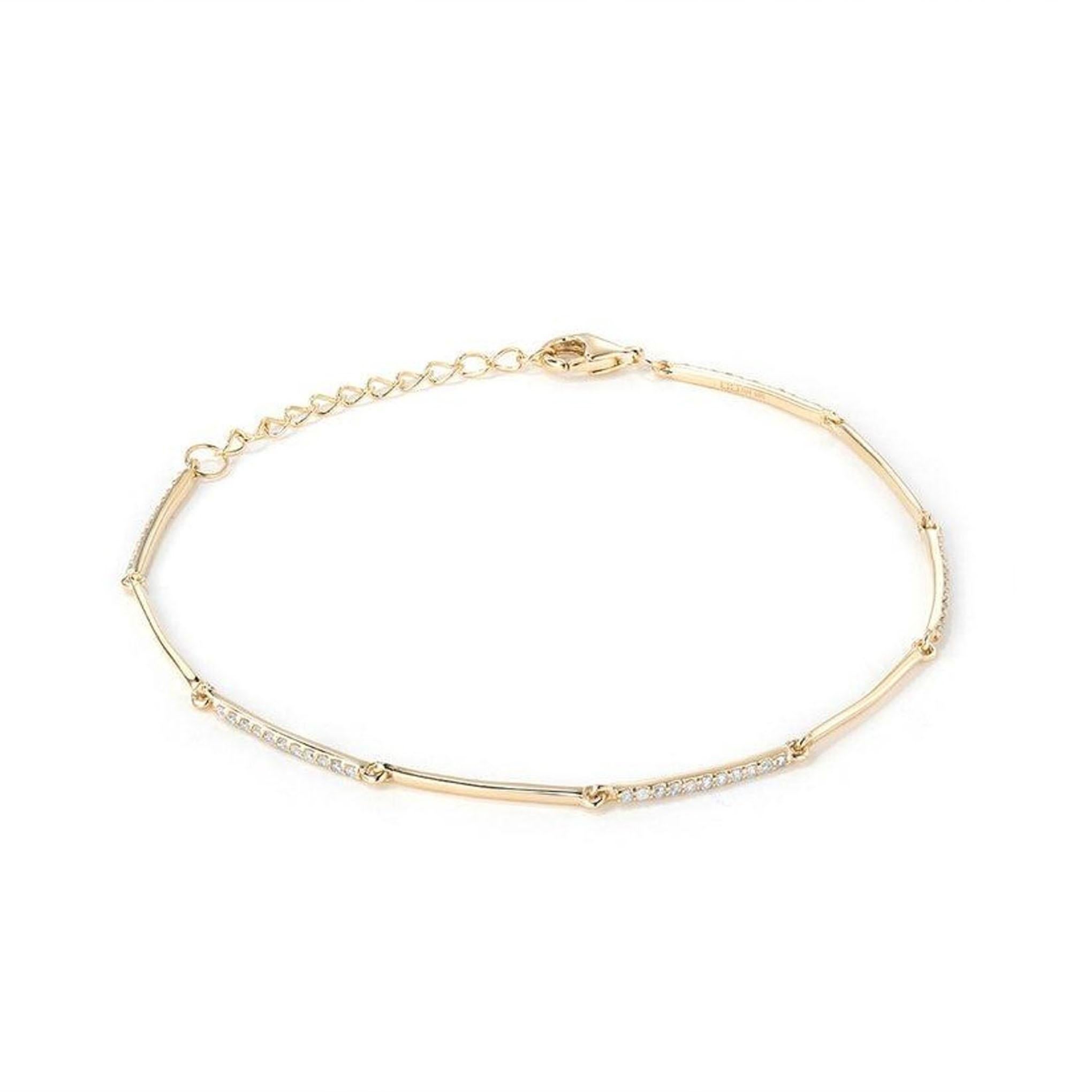 Bracelet à barre torsadée en or 14K avec chaîne de diamants