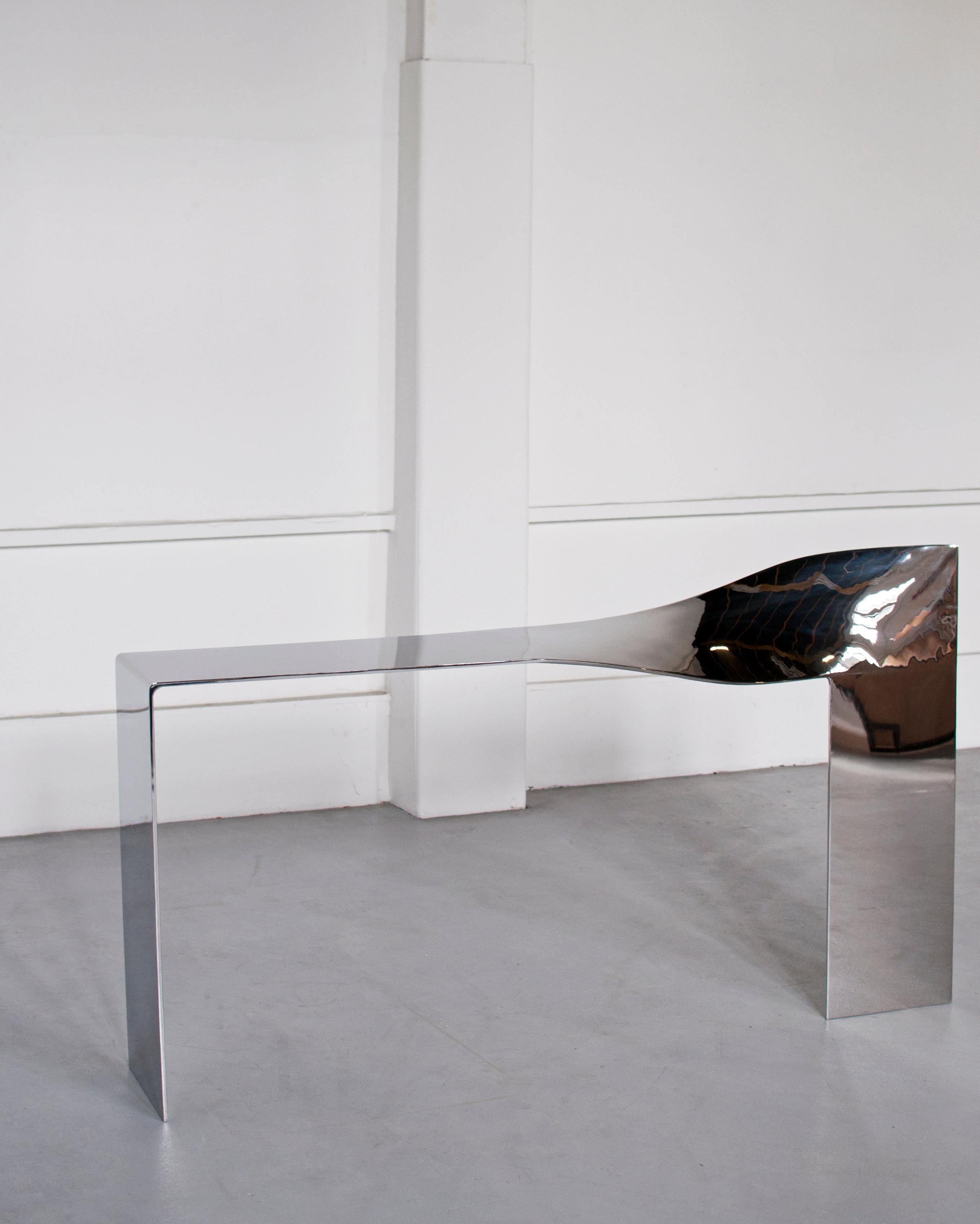 Twist Console by Pol Quadens 
Limited Edition Of 8+4 Pieces.
Dimensions: D 40 x W 200 x H 95/130 cm.
Materials: Polished stainless steel.

Pol Quadens was born in Brussels. His father was active in the fields of composites the metal industry, and