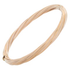 Twist design 14k rose gold hinged  bangle