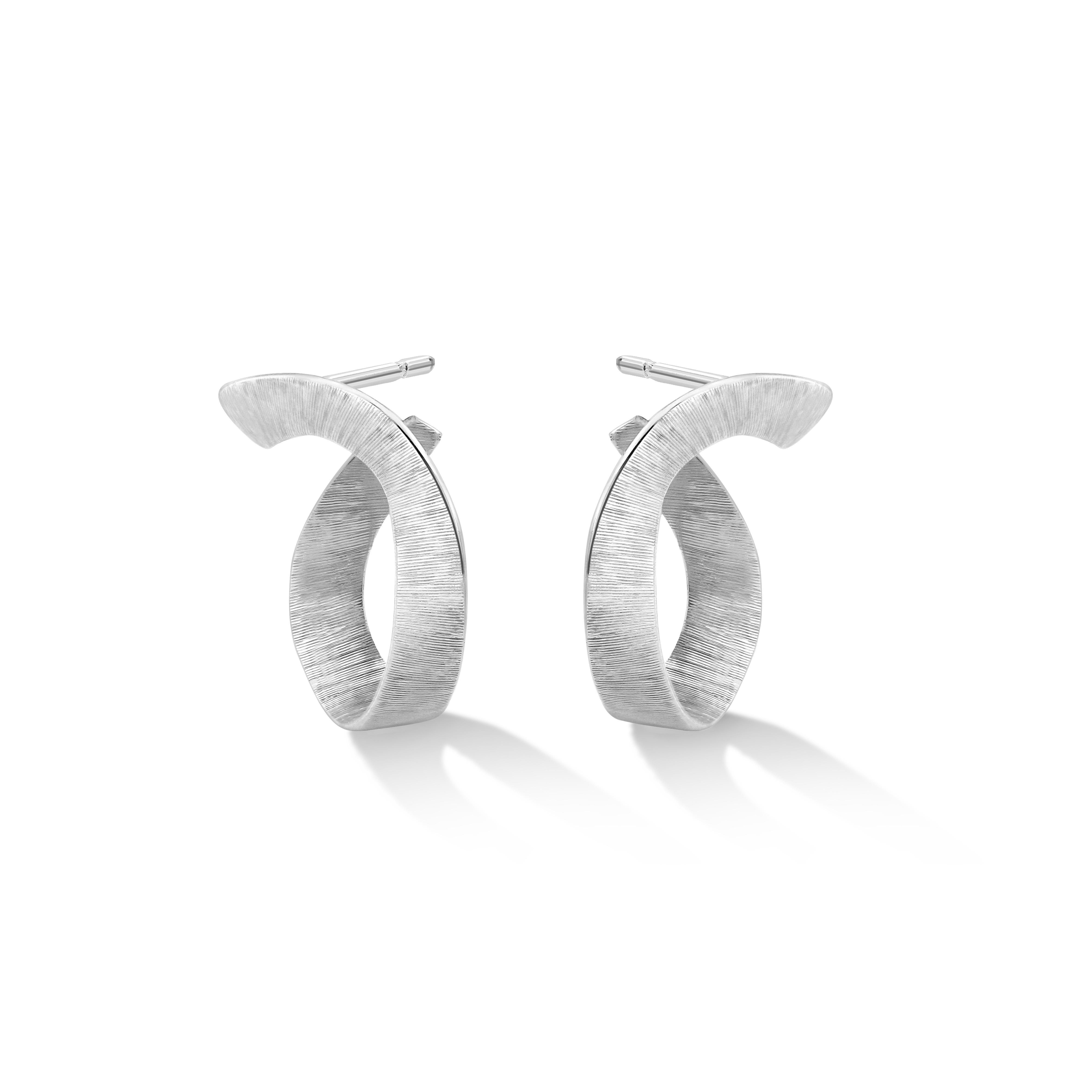Liv Luttrell 
Twist Hoop Earrings 2020


Details
18-karat white gold 
Silk engraving
Made in London  


Customisation 

As this design is handmade to your order, Liv is able to customise the material choices according to individual orders.

This