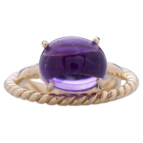 Bague moderne design artisanale en or jaune 18 carats avec améthyste torsadée d'amour