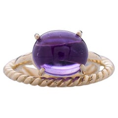 Bague moderne design artisanale en or jaune 18 carats avec améthyste torsadée d'amour