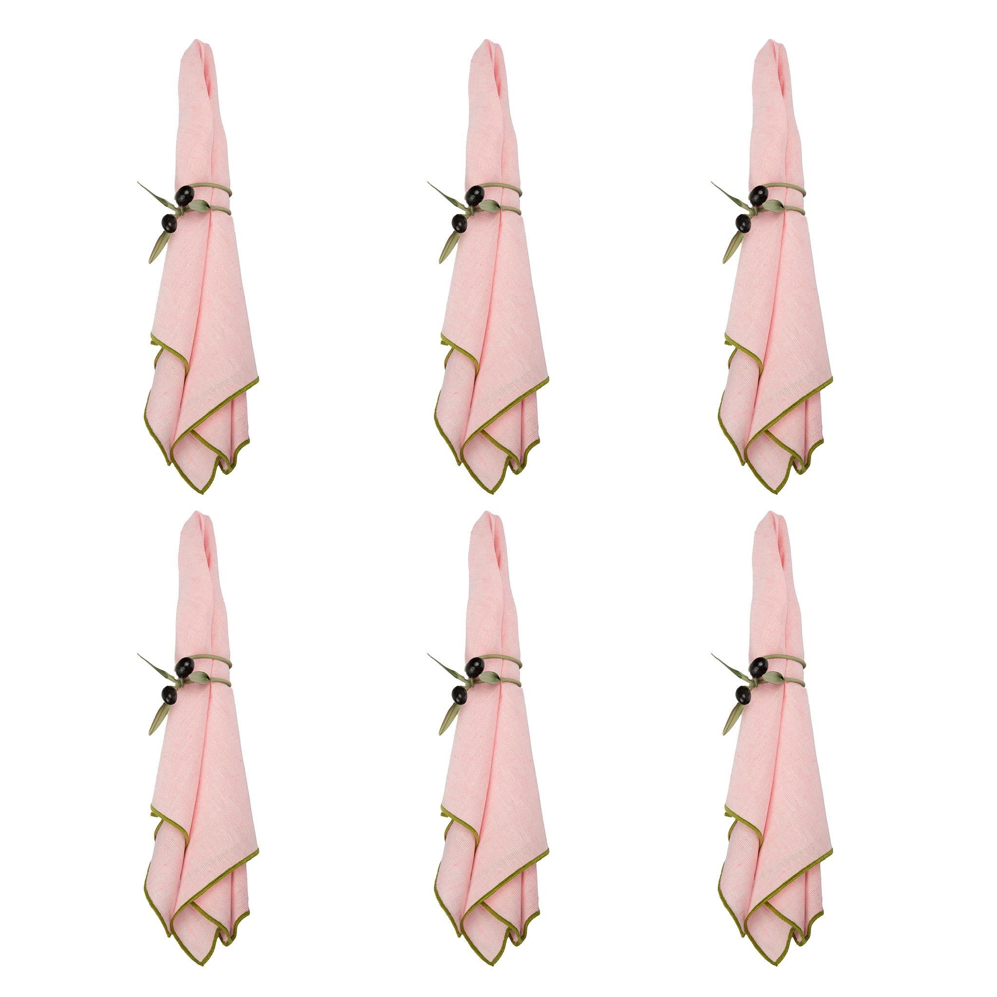 Add a touch of Provençal charm to your table with these exquisite Olive Branch Spiral Napkin Rings, handmade in Provence, France. Crafted from hand-worked metal and delicately painted to resemble lifelike olive branches, these napkin rings combine