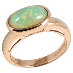 Anillo Twist de Ópalo en Engaste de Oro de 18K