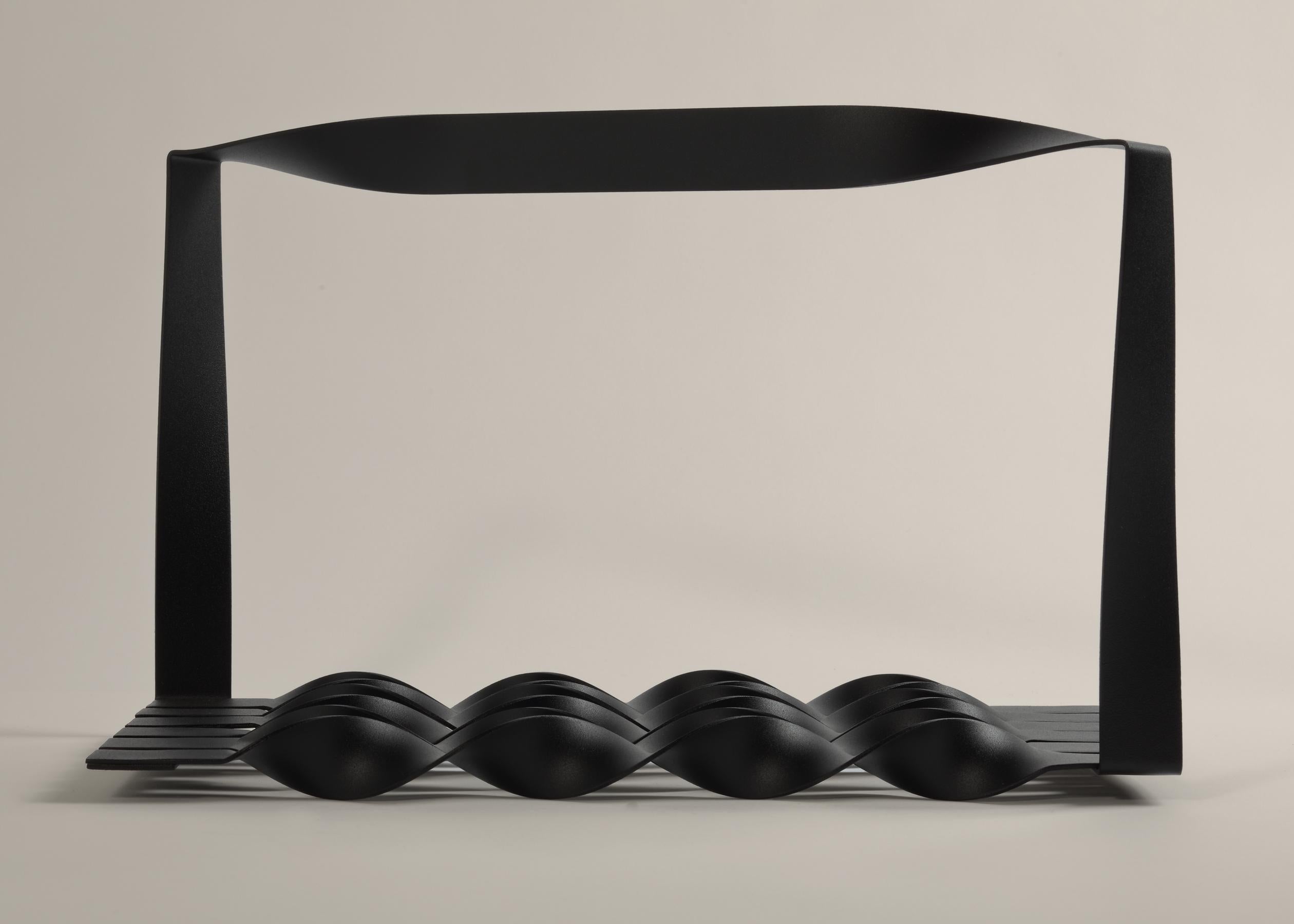 Designer Michael Schoner was inspired for this fruit rack by traditional blacksmith detailing, which he reinterprets to create a steel fruit rack black-coated in black where the fruits rest on the horizontal spirals. Heading towards countering,