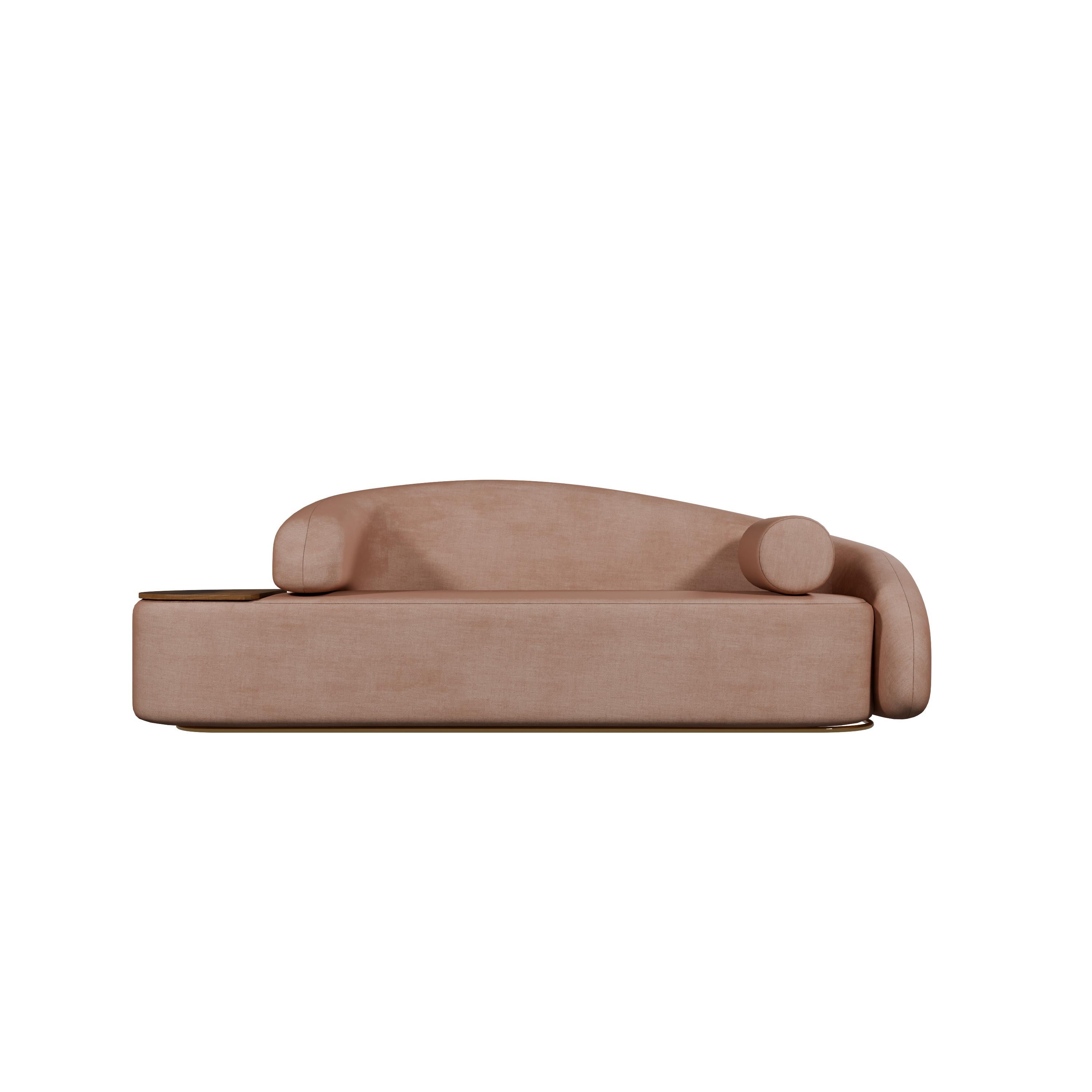 The Twist sofa, a masterpiece from Murmurio, is a bold statement piece that redefines contemporary design. Entirely upholstered and perched on a golden plinth, it exudes luxury and elegance. Its most striking feature is the asymmetrical armrests,