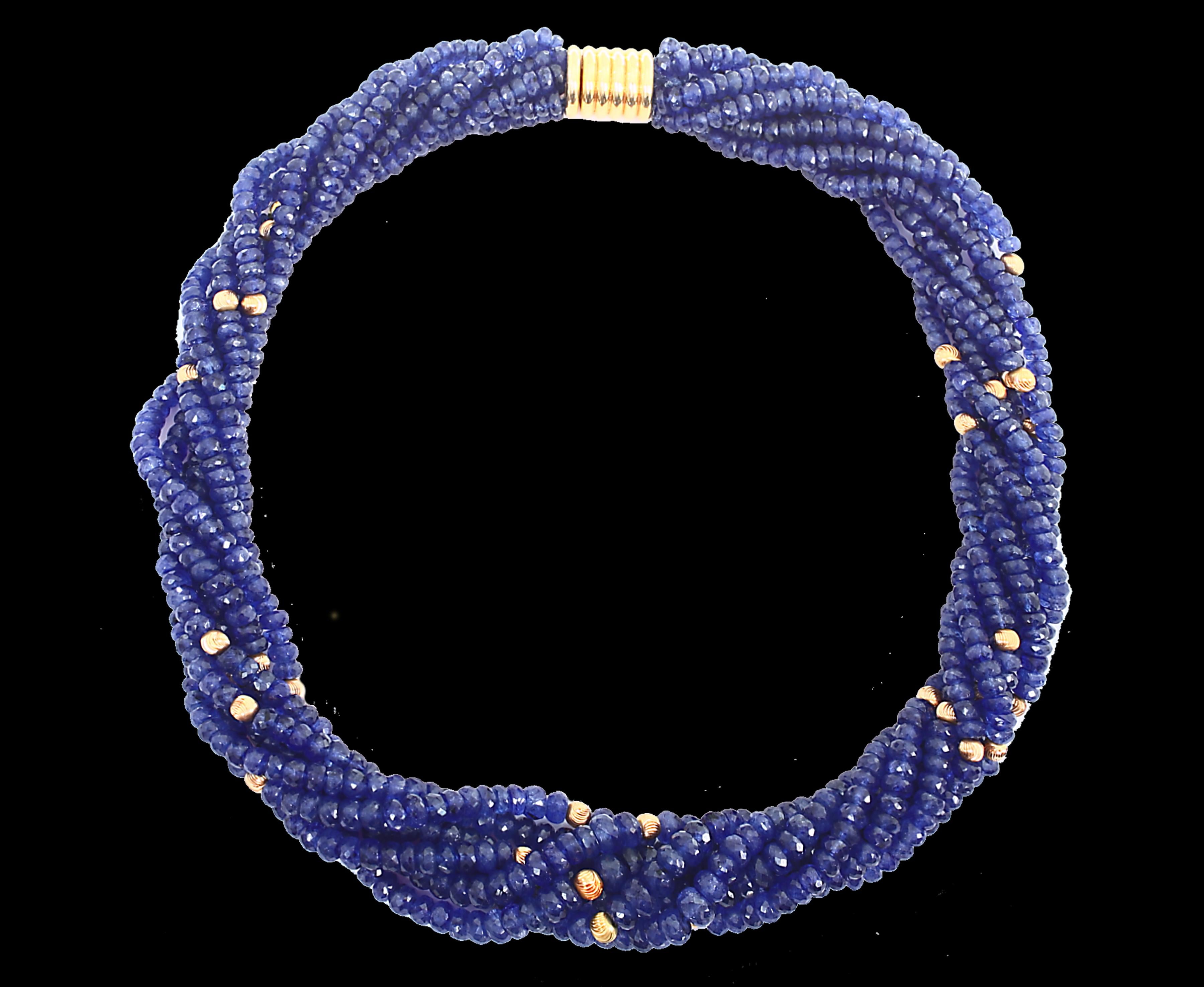 Twisted Faceted 1275 Ct Natural Tanzanite Bead Seven  Strand Necklace With  14 Karat Yellow  Gold balls 
All natural beads , no color enhancement
Twisted Necklace
7 layers of Natural  Beads
These are faceted  beads , have  very much  Luster and