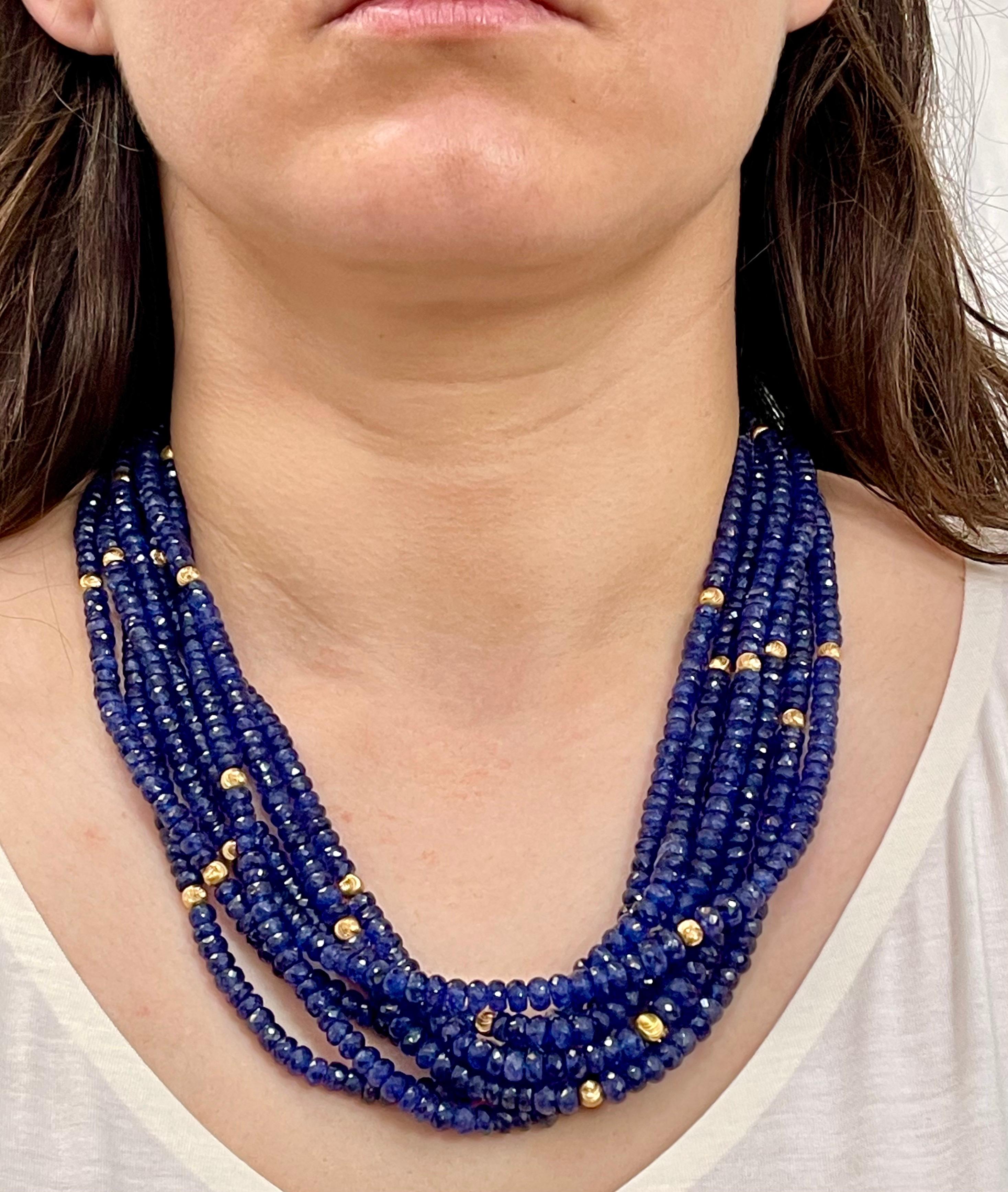 Twisted 1275 Ct Natural Tanzanite Bead Seven Strand Necklace + 15 Gm 14 K Y Gold In Excellent Condition For Sale In New York, NY