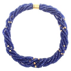 Collier torsadé à sept rangs de perles de tanzanite naturelle 1275 carats + or 14 carats