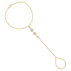 Bracelet à main torsadé 76 diamants en or jaune 14 carats