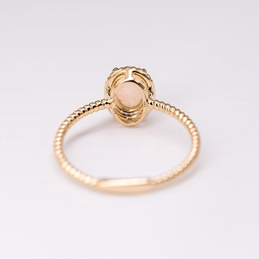 Oval Cut Twisted Band Oval Australian Solid Opal Ring in 14K Yellow Gold For Sale