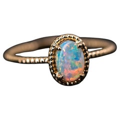 Twisted Band Oval Australian Solid Opal Ring in 14K Yellow Gold