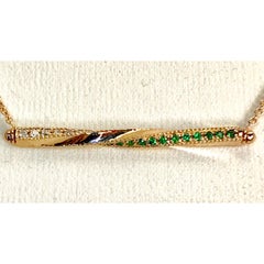 Twisted Bar Necklace in 14 Carat Gold with Emeralds and Diamonds