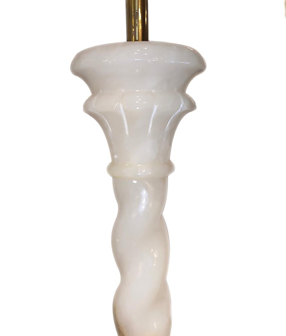 A single Italian circa 1940's carved twisted column alabaster table lamp with square base.

Measurements:
Height of body: 21