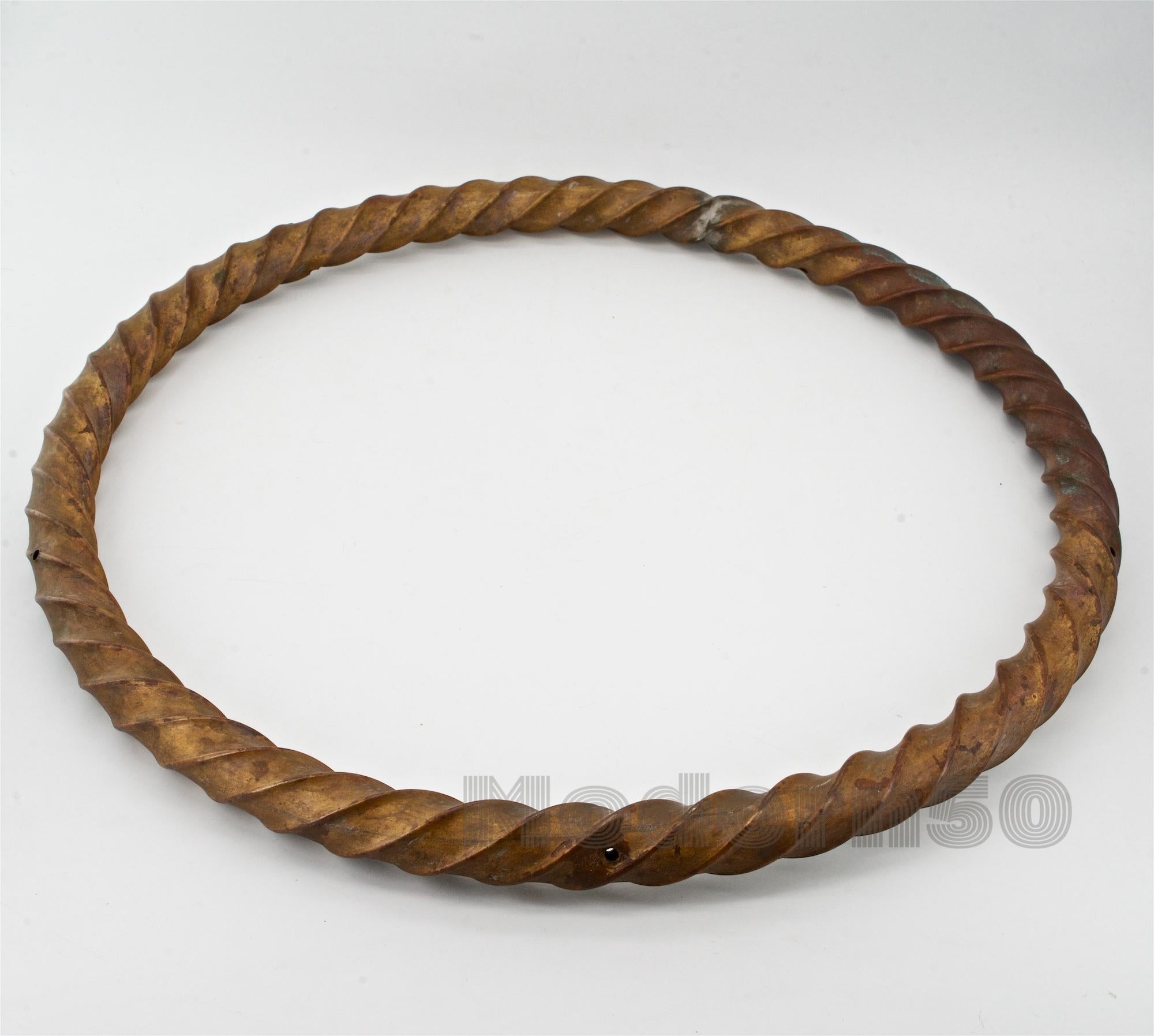 Antique late 19th century twisted Lanyard pattern copper tube circle form. Could be mounted or hung. Hollow with some holes from the hand crafting.