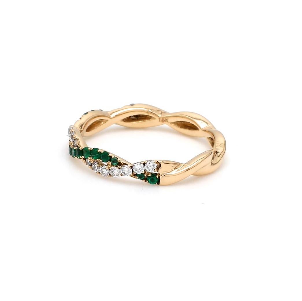 A Beautiful Handcrafted Twisted Ring in 18 Karat Yellow Gold  with Natural Emerald and Diamonds on Shank in a Twisted shank. A perfect Ring for occasion

 Emerald Details
Pieces : 18 Pieces Emerald Cut 
Weight : 0.19 Carat 
AAA Quality