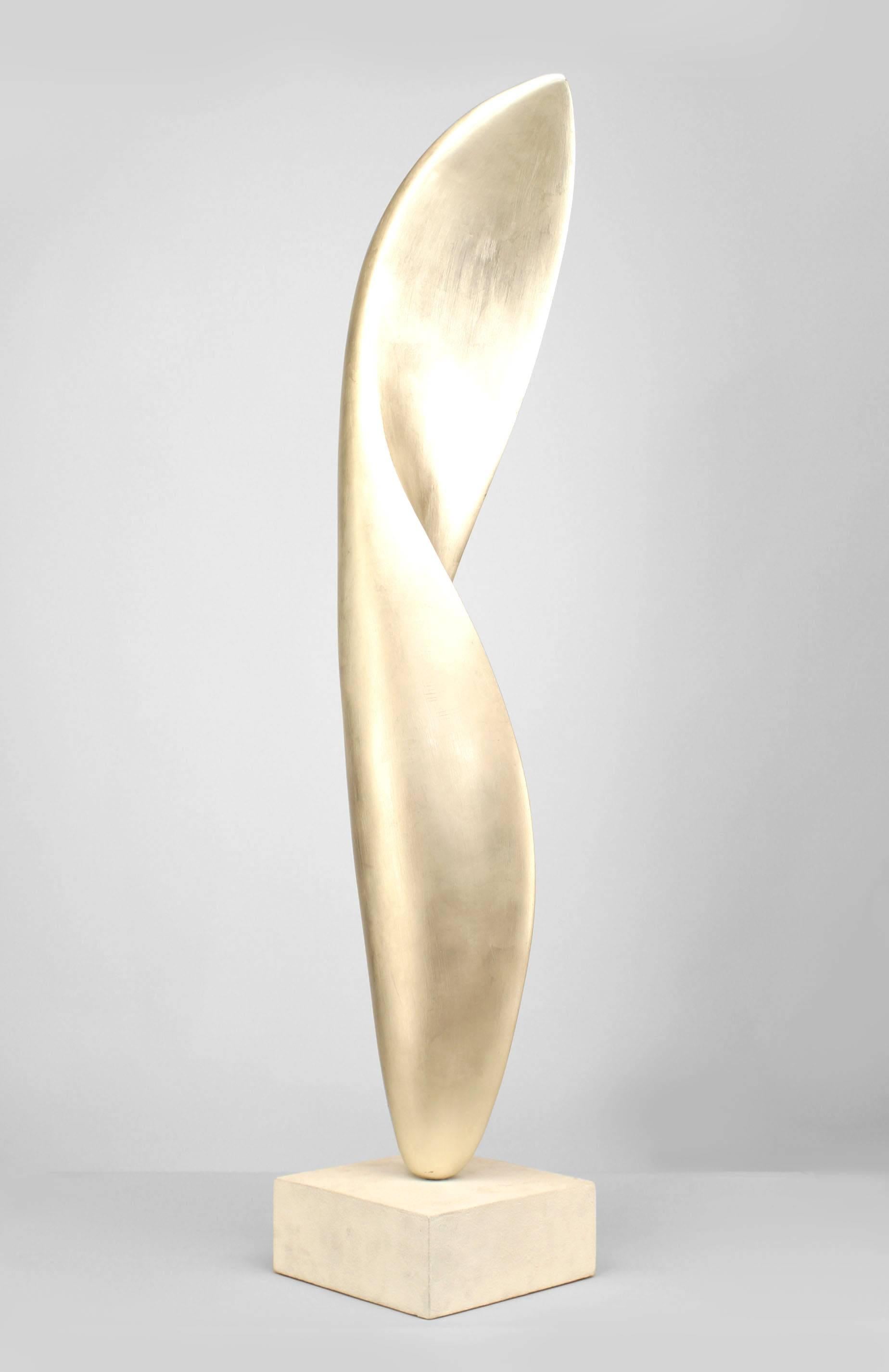 American Post-War Design silver leaf over resin sculpture of a vertical form mounted on a square base (Kevin Kelly)

